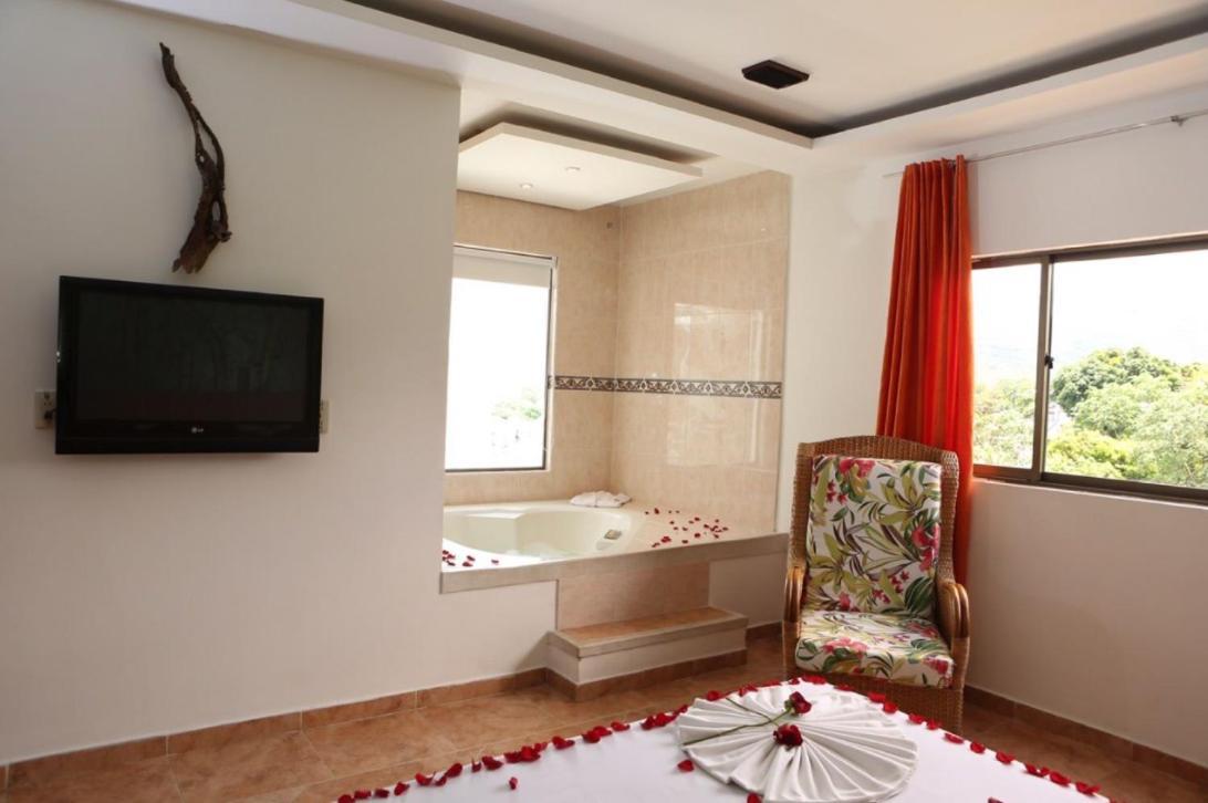 Hotel Anamichu Suites Melgar Exterior photo
