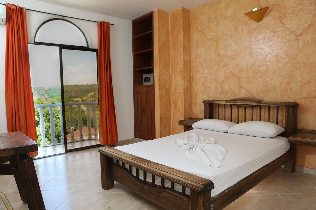 Hotel Anamichu Suites Melgar Exterior photo