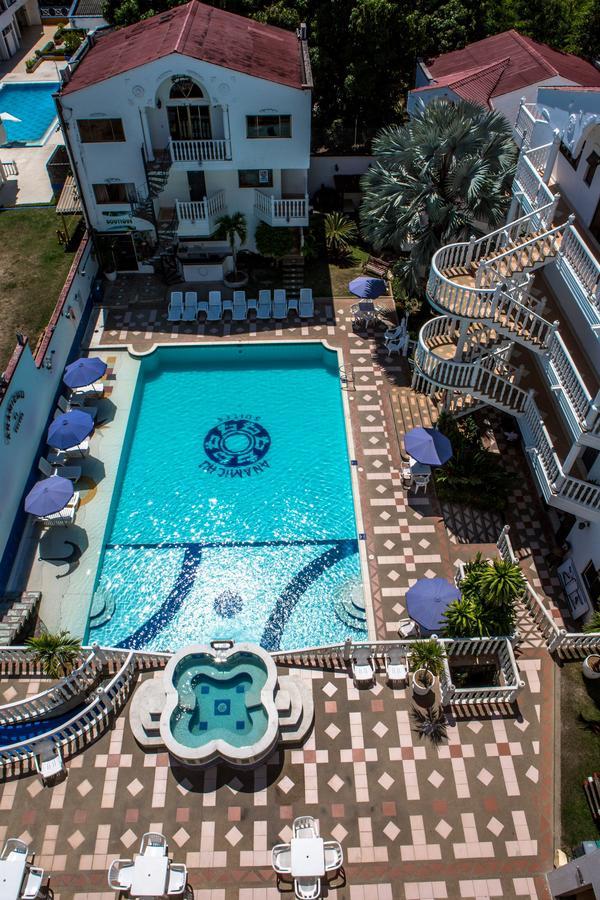 Hotel Anamichu Suites Melgar Exterior photo